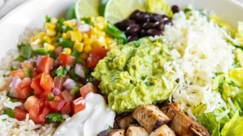 Homemade Chipotle burrito bowl with rice, beans, and fresh toppings