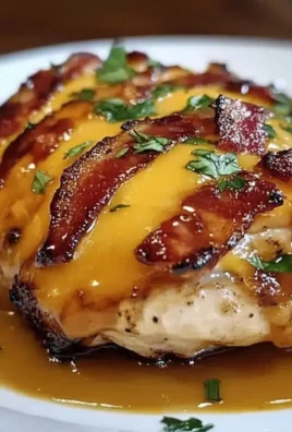 Delicious Cowboy BBQ Bacon Cheddar Chicken served on a wooden platter
