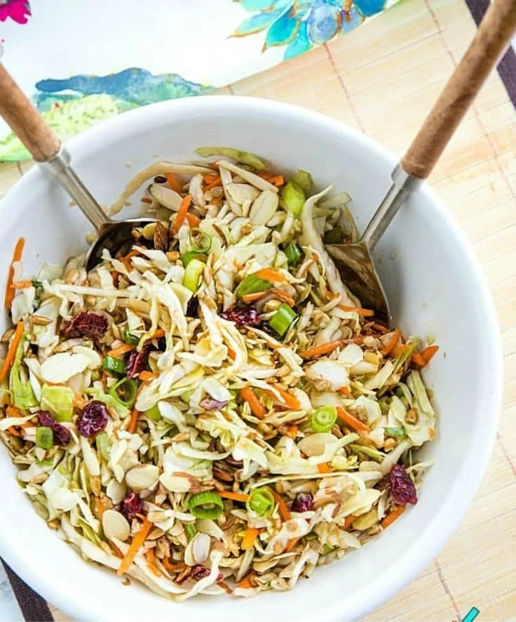 Cranberry Almond Cabbage Salad with vibrant ingredients and dressing