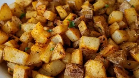 Plate of easy breakfast potatoes with herbs and spices