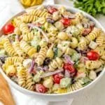 Bowl of easy creamy pasta salad with vibrant vegetables and dressing