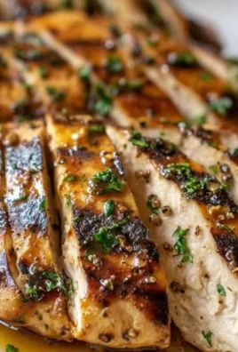 Juicy grilled chicken marinated and cooked to perfection on the grill.