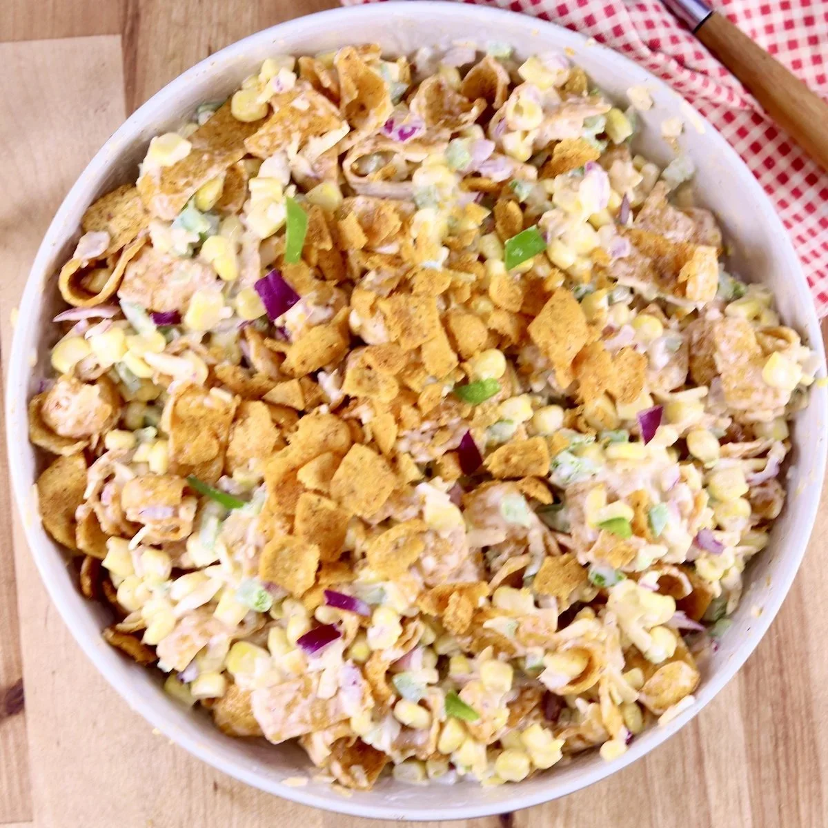 Delicious Frito Corn Salad with corn, Fritos, and creamy dressing