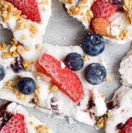 Delicious homemade frozen yogurt bark topped with fresh fruits and nuts