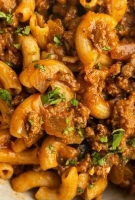 Bowl of gluten-free dairy-free Hamburger Helper with fresh ingredients.