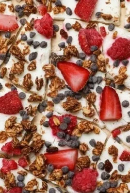 Delicious Greek Yogurt Bark topped with berries and nuts