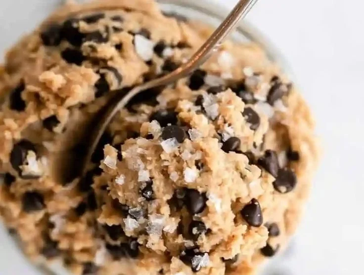 Bowl of healthy edible protein cookie dough with chocolate chips