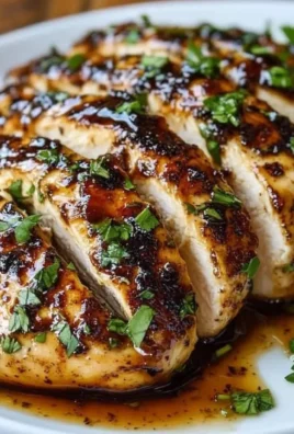 Juicy balsamic baked chicken breast with herbs and spices, ready to serve.