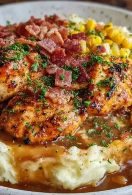 Juicy grilled chicken served in a bowl with creamy mashed potatoes