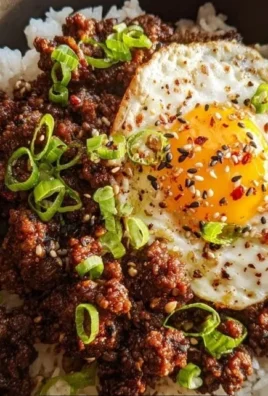 Korean Ground Beef Bowl with vegetables and rice in a colorful dish