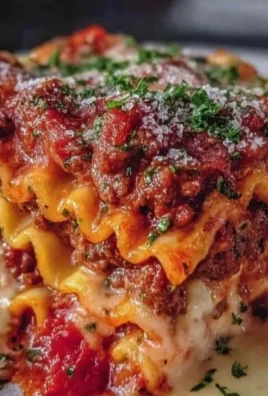Delicious homemade lasagna layered with cheese and rich sauce.