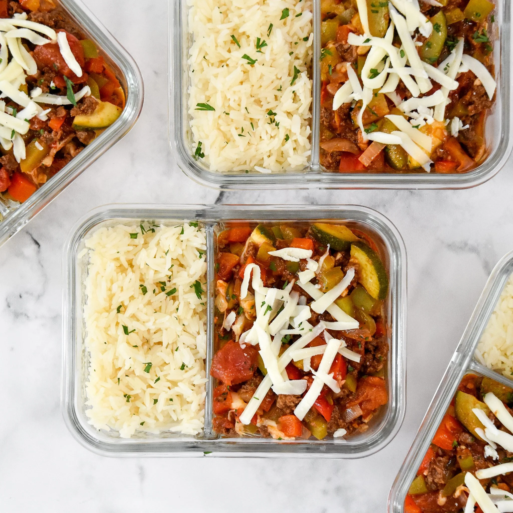 Colorful unstuffed pepper bowls filled with healthy ingredients for meal prep