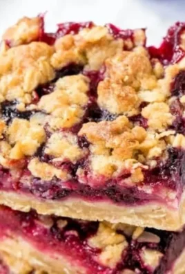 Delicious Mixed Berry Crumble Bars with a crispy topping and fresh berries