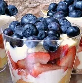 Delicious mixed berry mini trifles served in clear cups