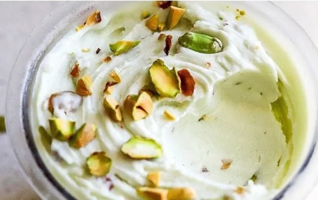 Delicious Ninja Creami Pistachio Ice Cream in a bowl with green pistachios