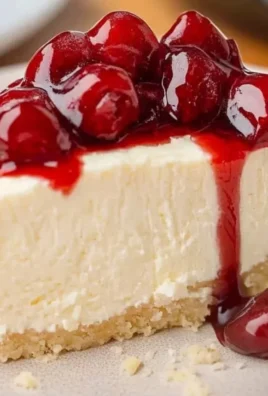 Delicious no bake cheesecake topped with Cool Whip and fresh berries