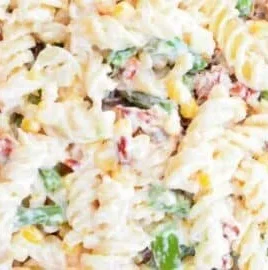 Pasta Salad with Creamy Parmesan Dressing served in a bowl with vegetables