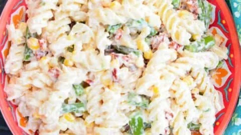 Pasta Salad with Creamy Parmesan Dressing served in a bowl with vegetables