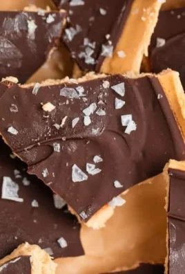 Delicious Peanut Butter Chocolate Greek Yogurt Bark sliced on a plate