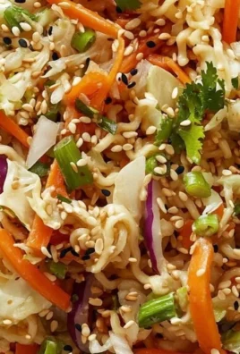 Colorful ramen noodle salad with vegetables and dressing