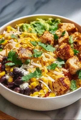 Delicious Southwest Chicken Bowl with colorful ingredients and spices.
