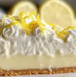 Tangy lemon icebox pie served on a summer day with fresh lemon slices
