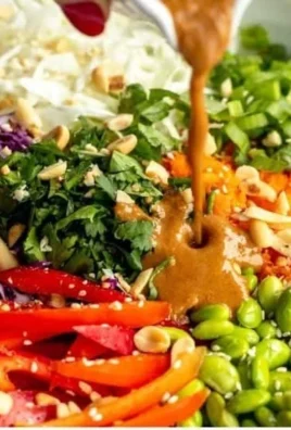 Thai Peanut Chicken Crunch Salad with colorful vegetables and creamy peanut dressing