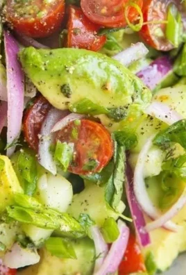 A vibrant avocado salad with fresh ingredients, ideal for healthy meals.