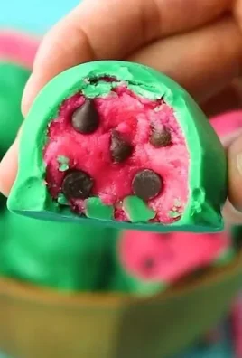 Delicious homemade watermelon truffles arranged on a plate.