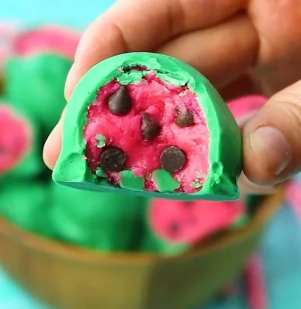 Delicious homemade watermelon truffles arranged on a plate.