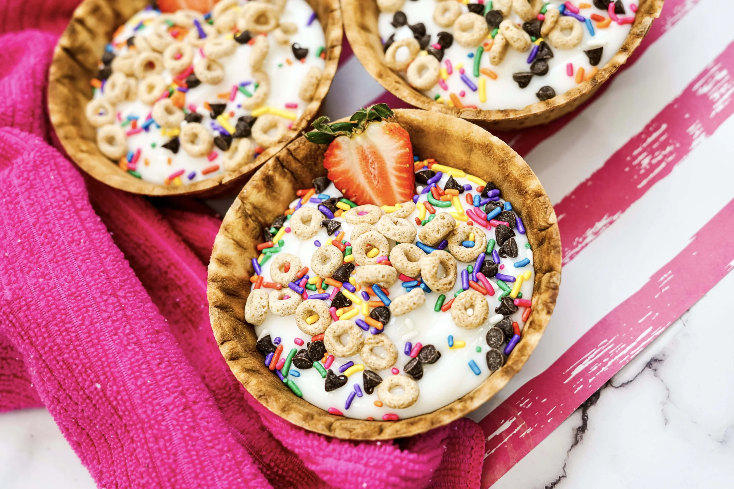 Delicious yogurt sundaes with fresh fruits and nuts